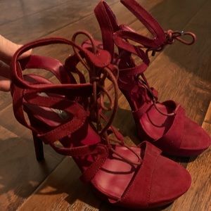 GUESS red lace up heel. never worn.
